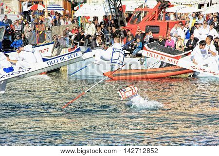 SETE, FRANCE - March 26 2016: Water Jousting performance during Stopover in Sete - Maritime Traditions Festival from the 22 to 28 march 2016 at the streets of Sete South of France