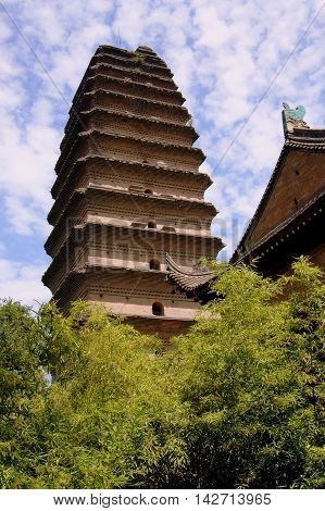 Xi'an China - September 8 2006: Groves of bamboo and the c . 684 Lesser Wild Goose Pagoda