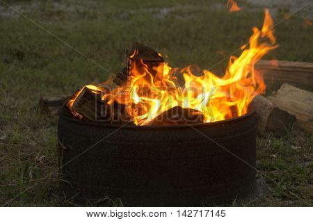 A campfire burns and creates a calming atmosphers at a campground in Emerald Isle North Carolina