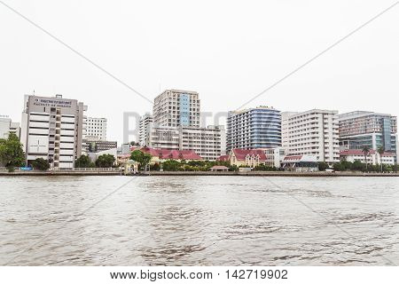 Bangkok, Thailand - June 5, 2016: Siriraj Hospital view from the other side of Chao Phraya River on cloudy day. It is the oldest and the most famous hospital in Thailand and part of Mahidol university