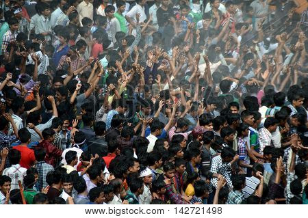 AMRAVATI, MAHARASHTRA, INDIA - AUGUST 29 : Crowd of young People enjoying 