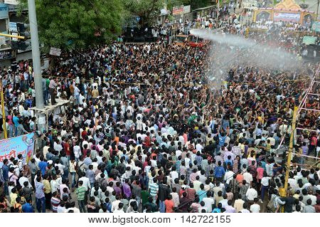 AMRAVATI, MAHARASHTRA, INDIA - AUGUST 29 : Crowd of young People enjoying 