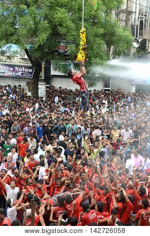 AMRAVATI, MAHARASHTRA, INDIA - AUGUST 29 : Crowd of young People enjoying 