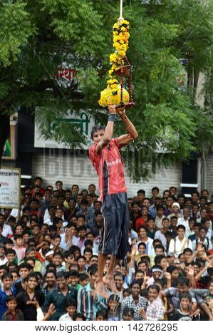 AMRAVATI, MAHARASHTRA, INDIA - AUGUST 29 : Crowd of young People enjoying 