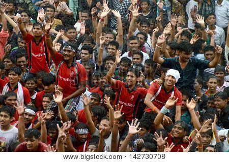AMRAVATI, MAHARASHTRA, INDIA - AUGUST 29 : Crowd of young People enjoying 