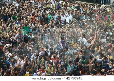 AMRAVATI, MAHARASHTRA, INDIA - AUGUST 29 : Crowd of young People enjoying 
