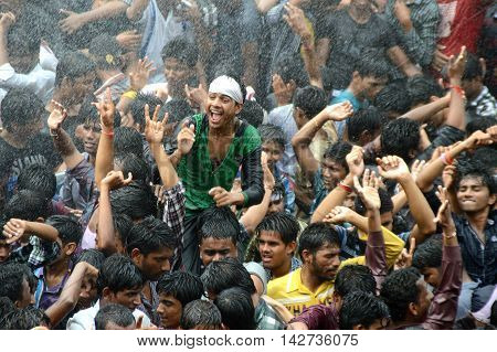 AMRAVATI, MAHARASHTRA, INDIA - AUGUST 29 : Crowd of young People enjoying 