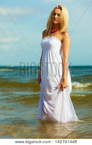 Young Woman Chilling Out On The Beach.