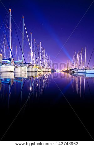 Yachts at a wharf at night in Turkey