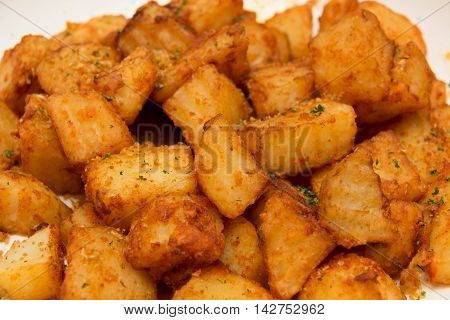 Spicy fried potaoes with wedges Indian delicay