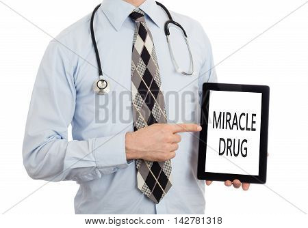 Doctor Holding Tablet - Miracle Drug