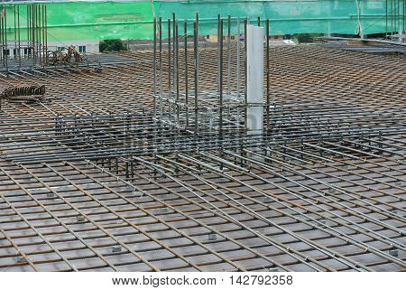 SELANGOR, MALAYSIA -MAY 18, 2016: Hot rolled deformed steel bars or steel reinforcement bar tied together before cast in the concrete. Its function is to increase the concrete strength.