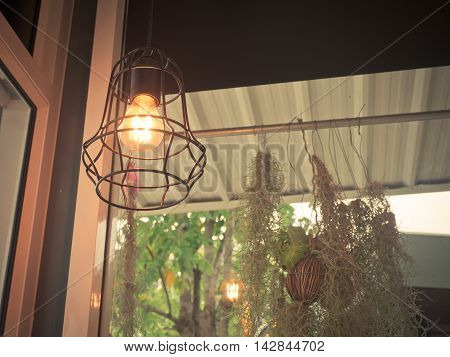 Edison's light bulb and lamp in modern style. Warm tone light bulb lamp. Lamps in coffee shop.