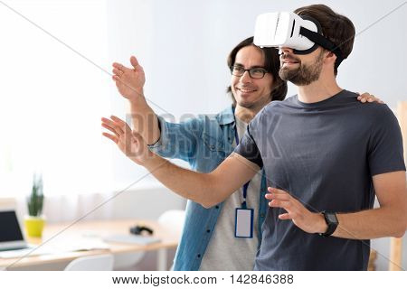 New experiment. Involved cheerful colleagues testing virtual reality glasses and working on the project while working in the office