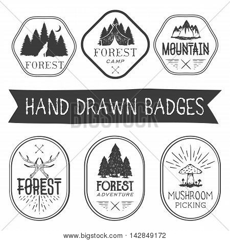 Vector set of hand drawn forest camp labels in vintage style. Design elements, icons, logo, emblems and badges isolated on white background. Logotype template illustration with forest and mountains.