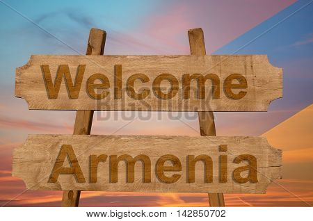 Welcome To Armenia Sing On Wood Background With Blending National Flag