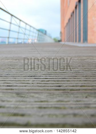 Wooden gangplank or bridge with selective focus and copy space.