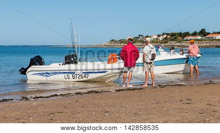 Men Returning From A Sea Fishing Competition