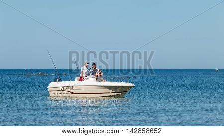 Boat Back On The Beach At A Sea Fishing Competition