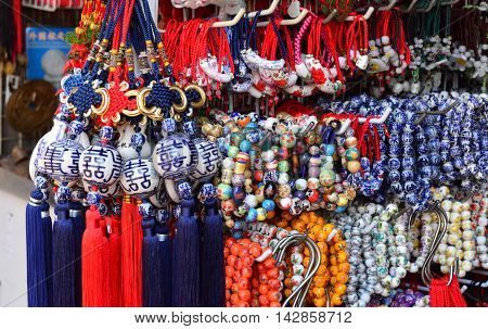 Hanging vunch of beautiful ceramic Chinese amulet