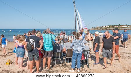 Man Shows His Fish In A Sea Fishing Competition
