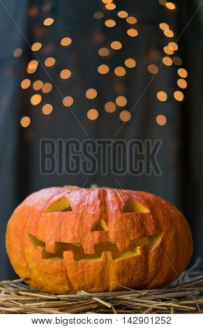 Halloween pumpkin on a gray background. Space for text.