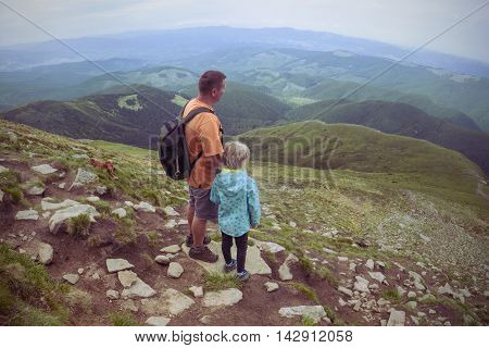 dad with daughter in the Carpathian Mountains. Ukrainian landscape. Goverla