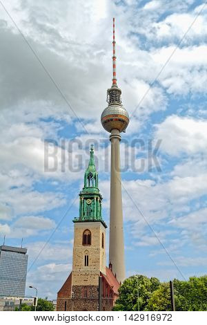 St. Mary Church (Marienkirche) and TV Tower (Fernsehturm) in Berlin, Germany.