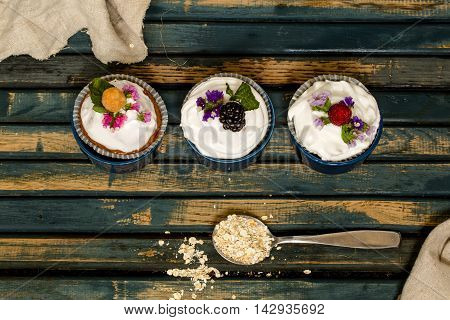 Beautiful Muffins With Berries On Wooden Background Nuts Honey