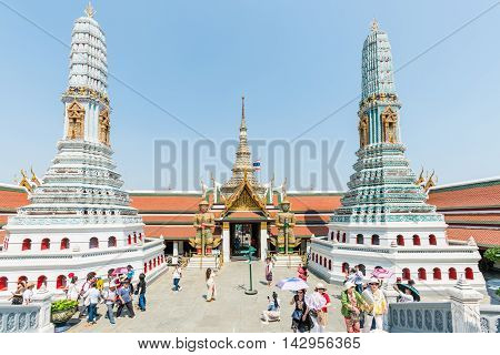 BANGKOK THAILAND - MARCH 9 2016: Chinese tourists at Wat Phra Kaew The most famous tourist attraction in Bangkok Thailand.