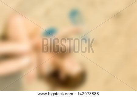Sexy girl at the beach theme creative abstract blur background with bokeh effect