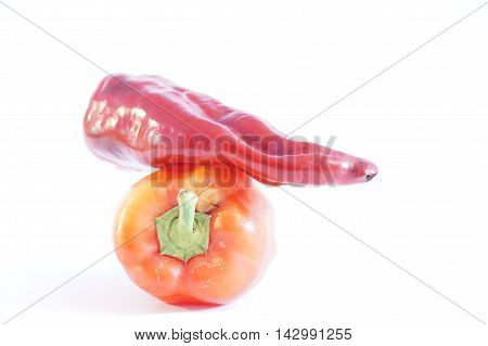 Red hot and sweet peppers isolated on white batskground