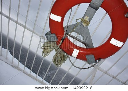 Lifering on the ferry board. Transportation the winter.