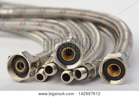 Bundle Flexible hoses for plumbing work, close up