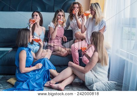 Girls Party. Beautiful Women Friends Having Fun At Bachelorette Party. They Are Celebrating And Drin