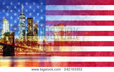 New York City's Brooklyn Bridge And Manhattan Skyline Illuminated American Flag