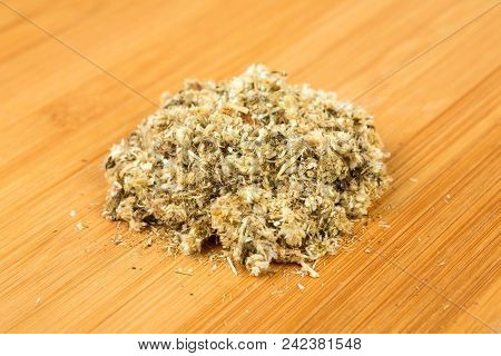 Pile Of Dried Mullein Leaves On A Wood Background