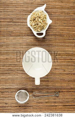 Dried Mullein Leaf Tea On A Wood Background