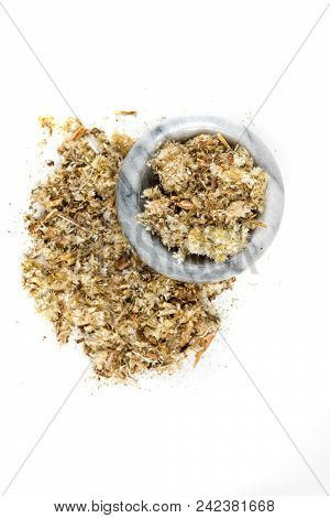 Dried Mullein Leaf Tea In A Bowl Isolated On A White Background