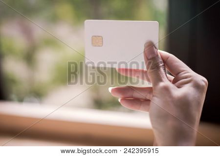 Closeup The Hand Of Businessman Is Holding Hand Credit Card And Hand Of Businesswoman Reading Text M