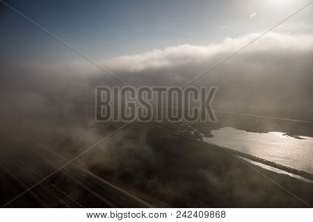 Beautiful Clouds Flying Over The Lake Near Mountains. Evening Time Shot Over The Clouds. Baku, Azerb