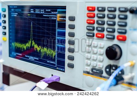 Fragment Of A Modern Digital Oscilloscope. Scientific Measuring Equipment. Abstract Industrial Backg