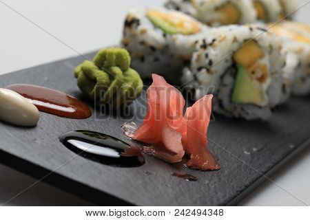 Sushi Set On Black Plate, Closeup Of Food