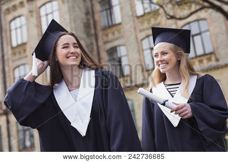 Unforgettable Time. Two Good-looking Postgraduate Students Feeling Happy While Enjoying Unforgettabl