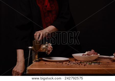 Woman Stirring Cooked Minced Meat In Kitchen.
