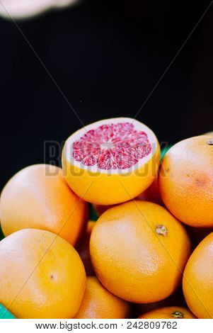 Mix Of Oranges Opened For Buyers Checking At The Stand. Local Market, S. Ambrogio, Florence Italy