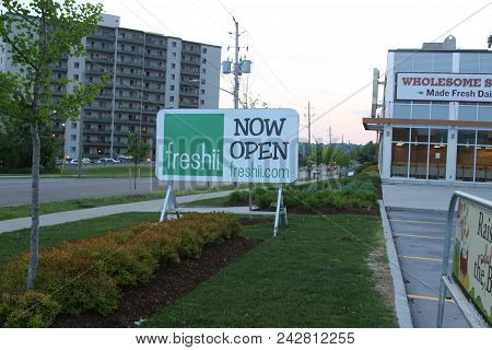 London Canada, May 28 2018: A Sign For Freshii Restaurant Anouncing The Grand Opening Of A New Locat