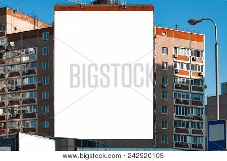 Blank Vertical Billboard On Direct Sunlight. Background For Mock-up.