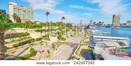 Cairo, Egypt - December 24, 2017: The Riverside Promenade On Gezira Island With Cozy Ornamental Gard