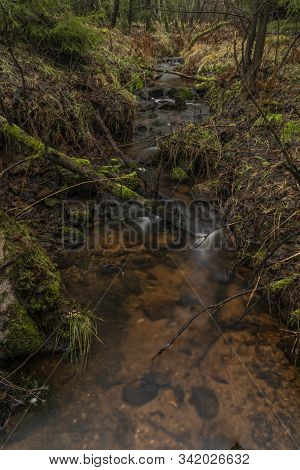 Upper Watercourse Of Bilina River In Krusne Hory Mountains In Winter Day